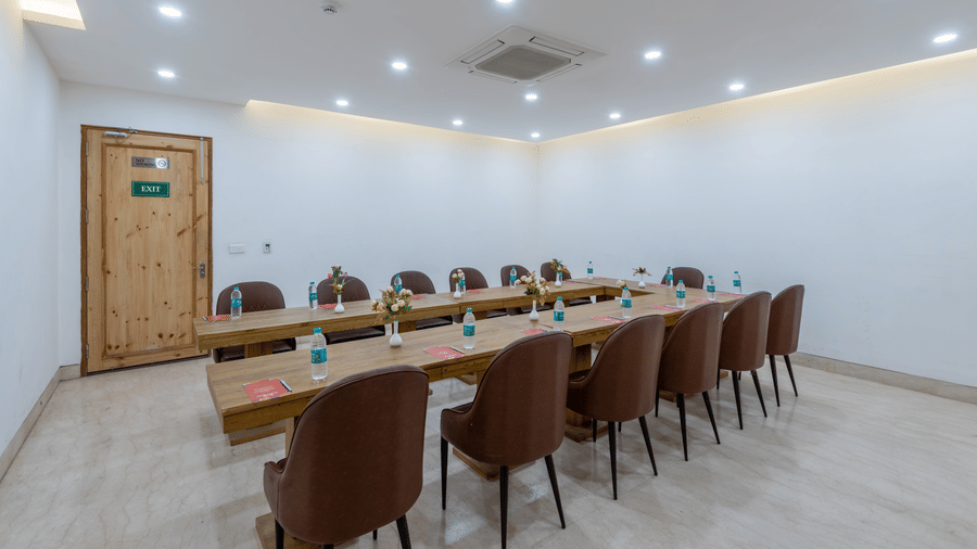 Spacious conference room with multiple chairs arranged for a meeting or event at DLS The Classio
